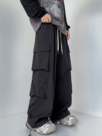 Men's plus size loose fit cargo pants with drawstring in camel color, stylish and comfortable by Trendsi.