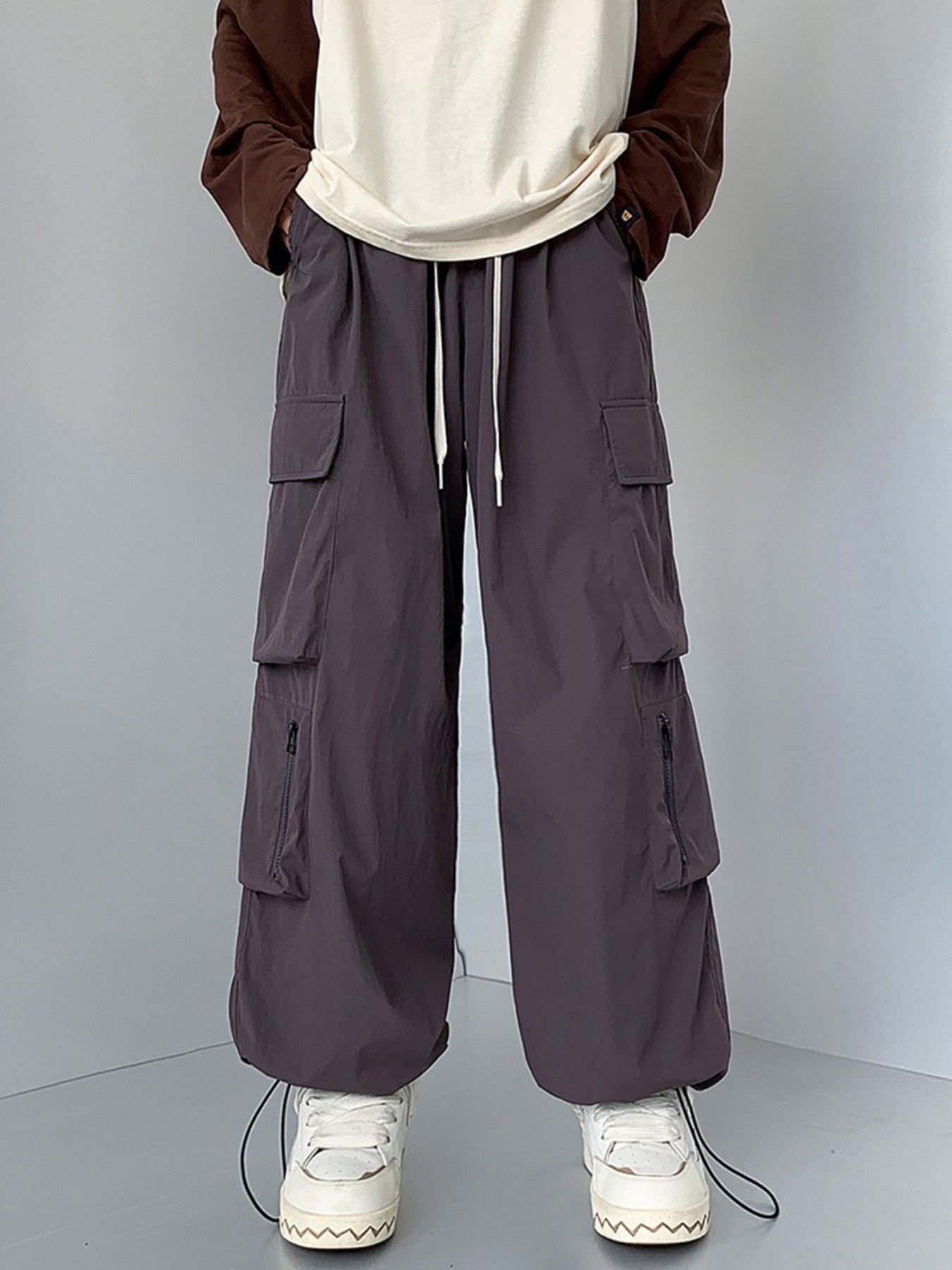Men's plus size loose fit cargo pants with drawstring in camel color, casual comfort, by Trendsi.