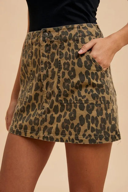 Leopard print denim mini skirt from Annie Wear by Trendsi, featuring a stylish fit and trendy animal print design.