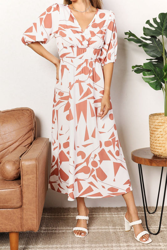 Camel printed surplice balloon sleeve dress by Trendsi, featuring a flowing design and stylish balloon sleeves.