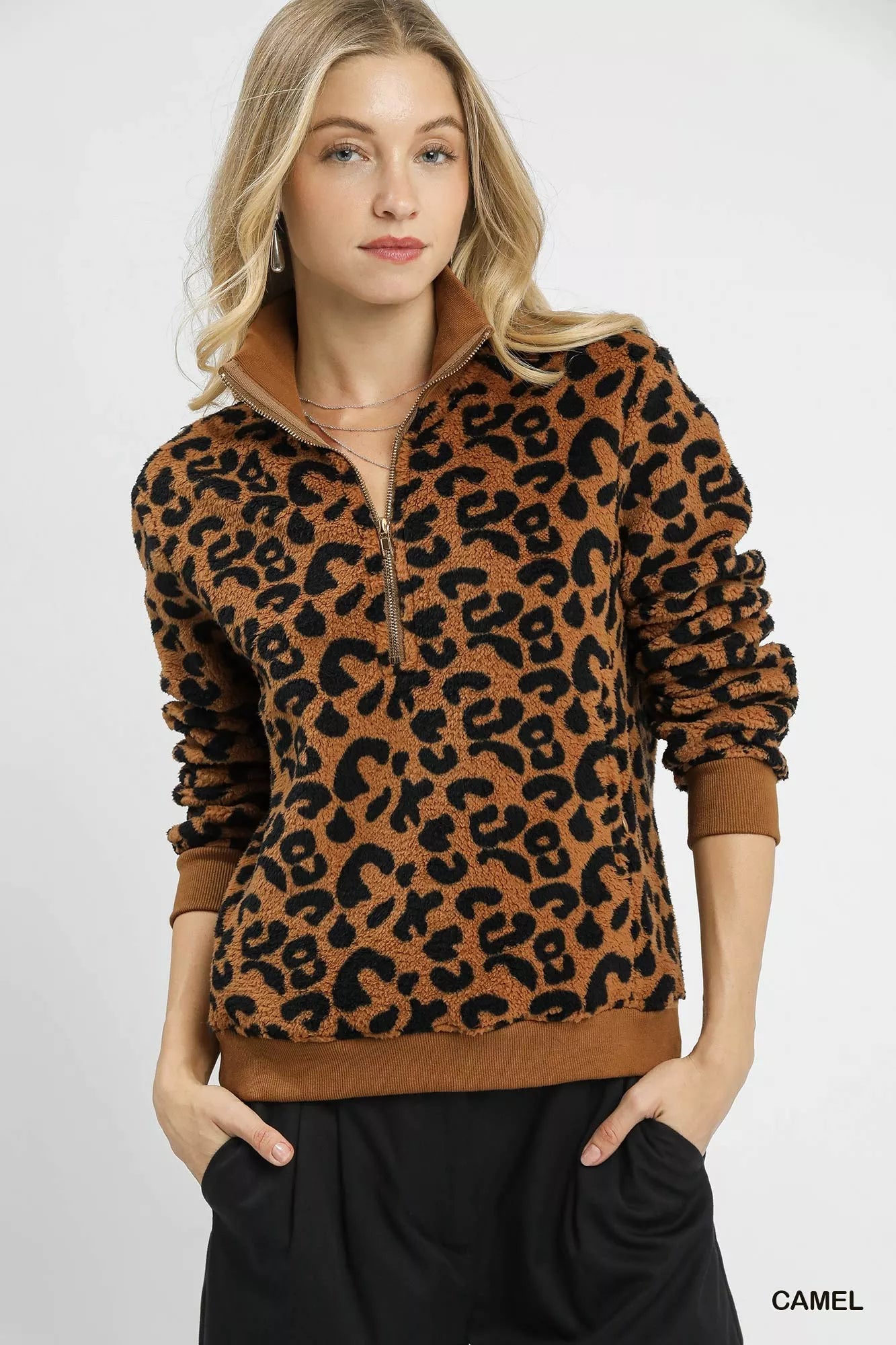 Camel leopard print Umgee quarter-zip sweatshirt from Trendsi, featuring a cozy fit and stylish animal print design.