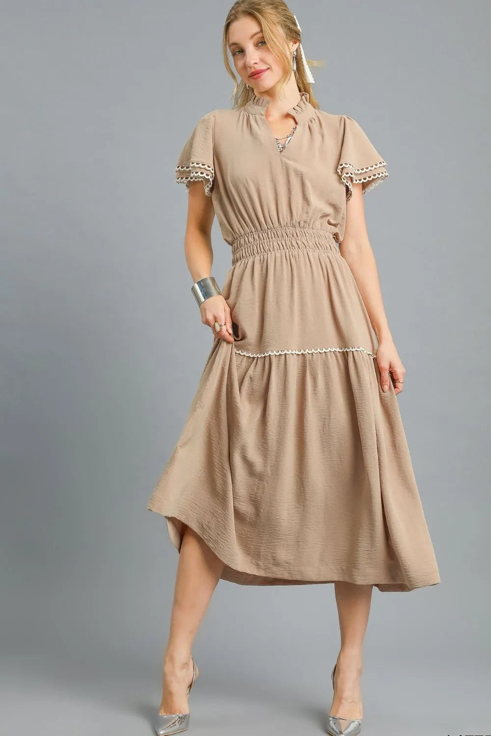 Camel Umgee tiered midi dress with flutter sleeves, flowing silhouette, and feminine style, perfect for casual or semi-formal wear.