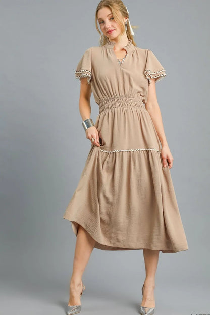 Camel Umgee tiered midi dress with flutter sleeves, flowing silhouette, and feminine style, perfect for casual or semi-formal wear.