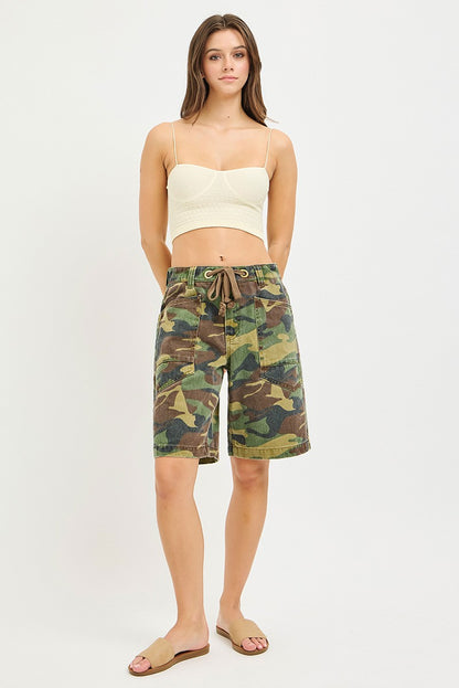 Camo print slouchy jorts by RISEN with eyelet drawstring and relaxed fit, styled with casual and trendy details.
