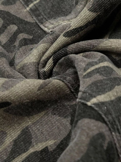 Men's camouflage cargo pants in green and brown, trendy military-inspired design from Trendsi, with multiple pockets and relaxed fit.