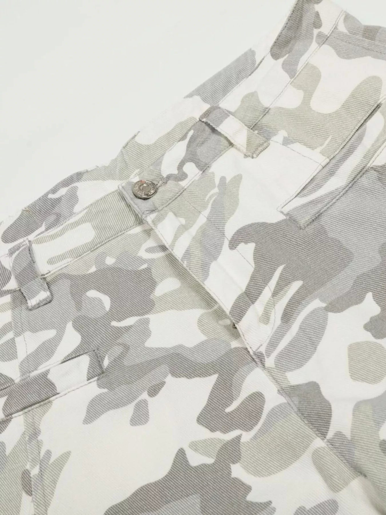 Men's camouflage wide-leg cargo pants from Trendsi featuring a relaxed fit and multiple pockets in a green and brown camouflage pattern.