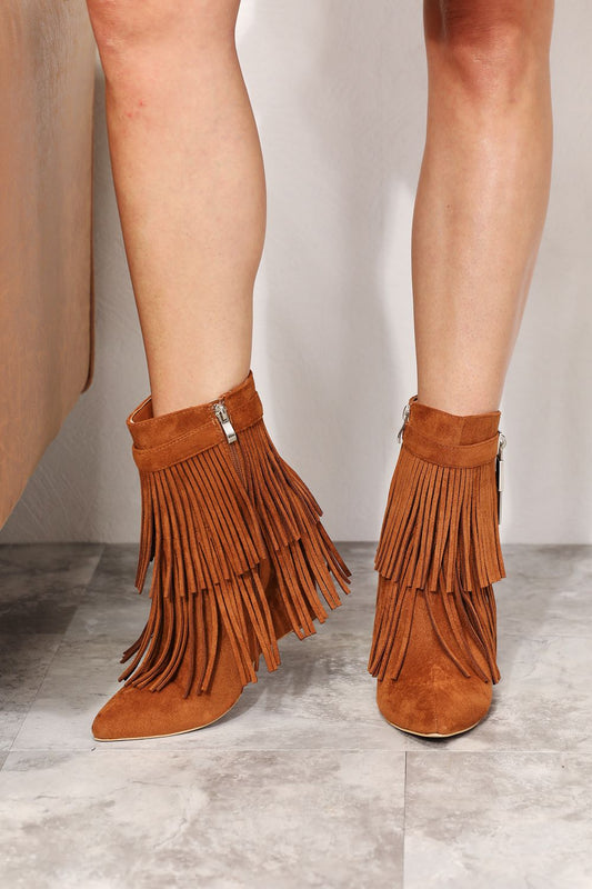 Caramel Legend Women's Tassel Wedge Heel Ankle Booties with stylish tassels and a comfortable wedge heel.