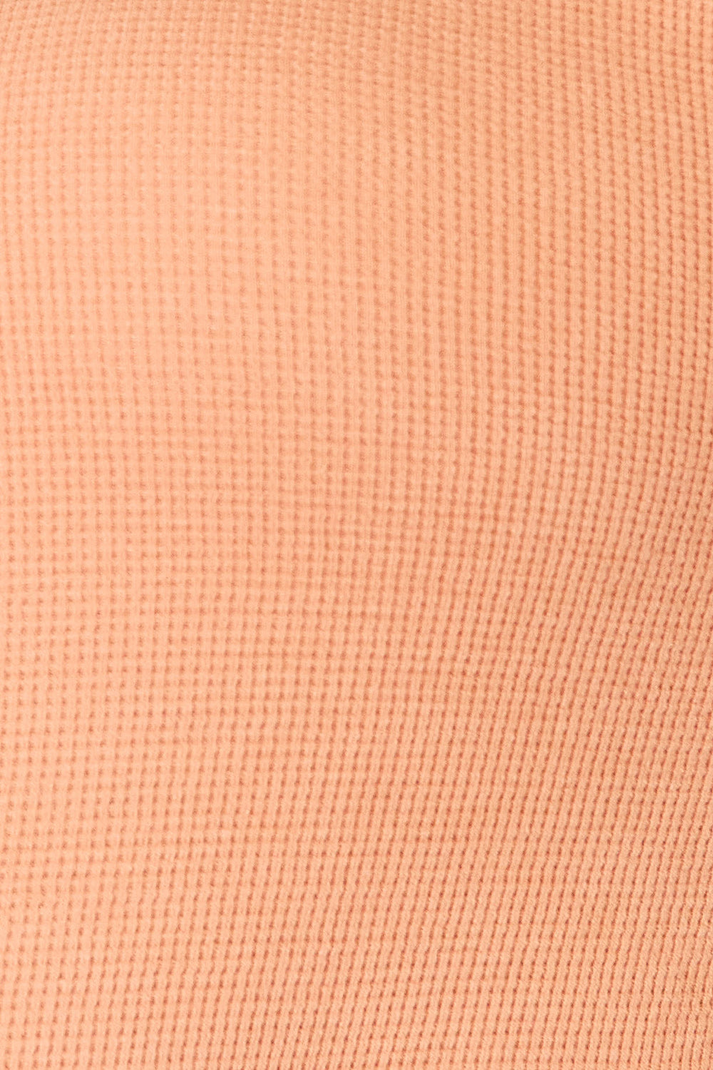 Caramel-colored Basic Bae half-button long sleeve top by Trendsi, featuring a relaxed fit and classic design.