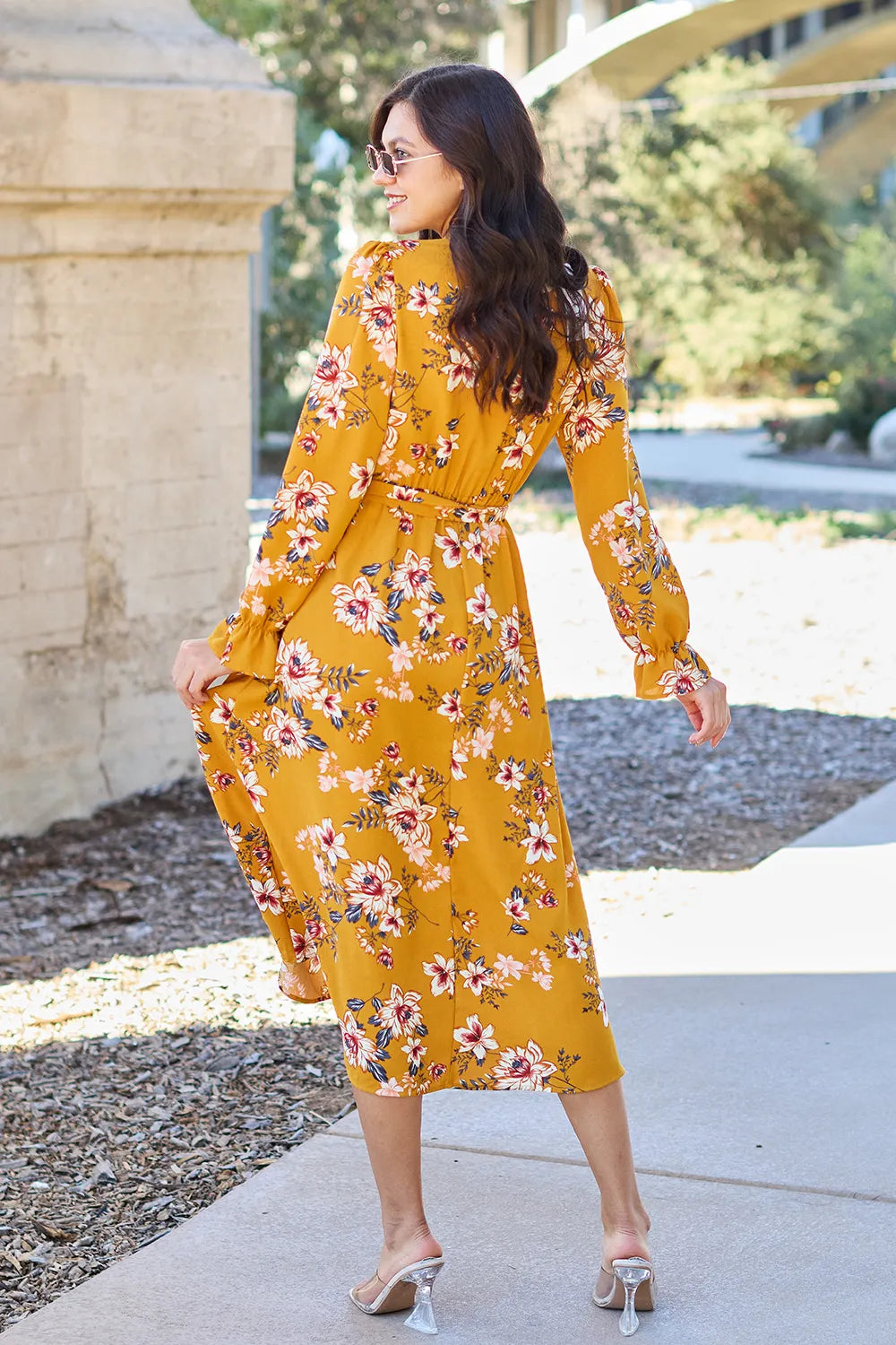 Caramel floral tie-back flounce sleeve dress by Trendsi, full size, with a flowing silhouette and decorative floral pattern.