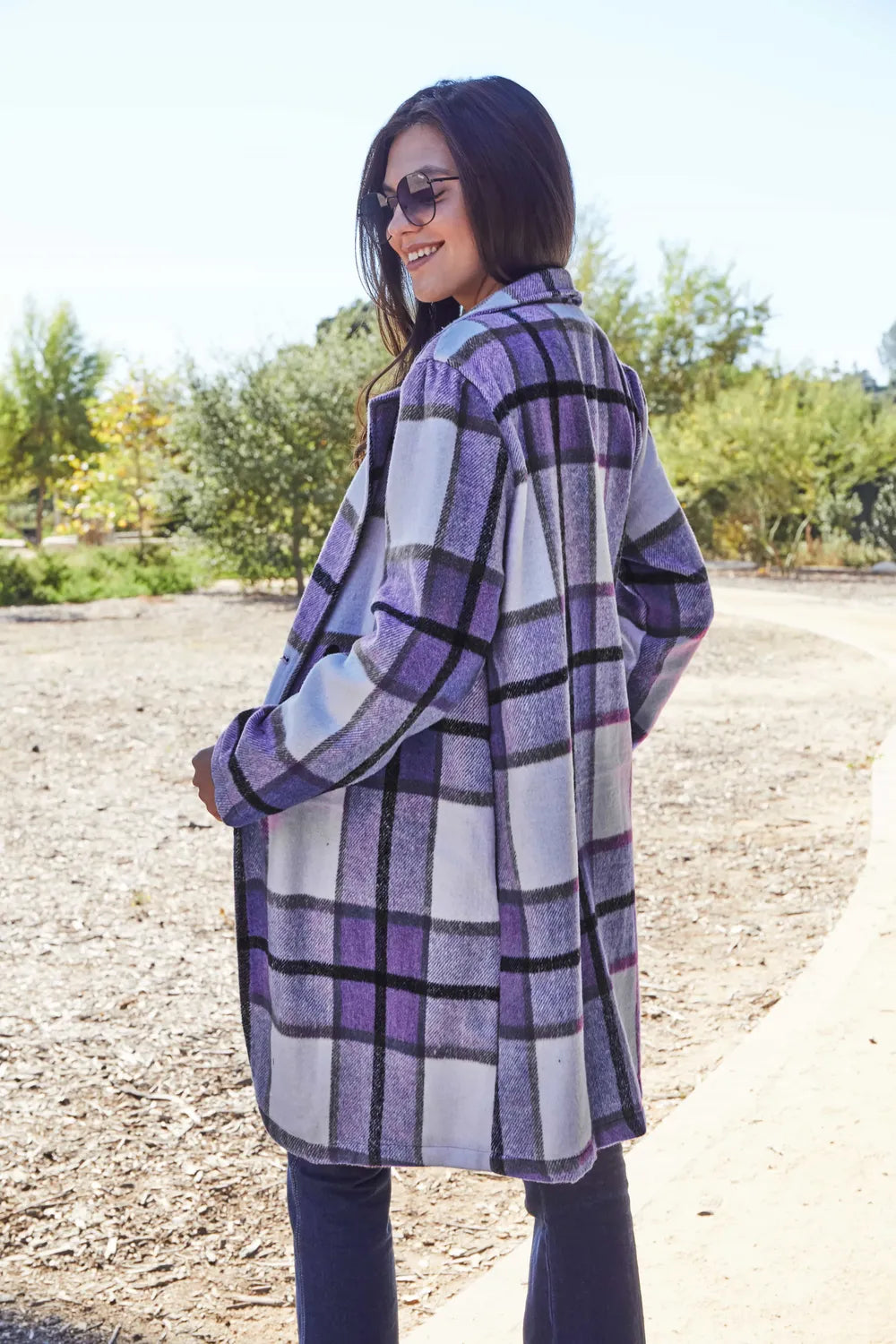 Carnation pink plaid button-up coat with lapel collar by Trendsi, featuring a full-size, stylish design and classic pattern.