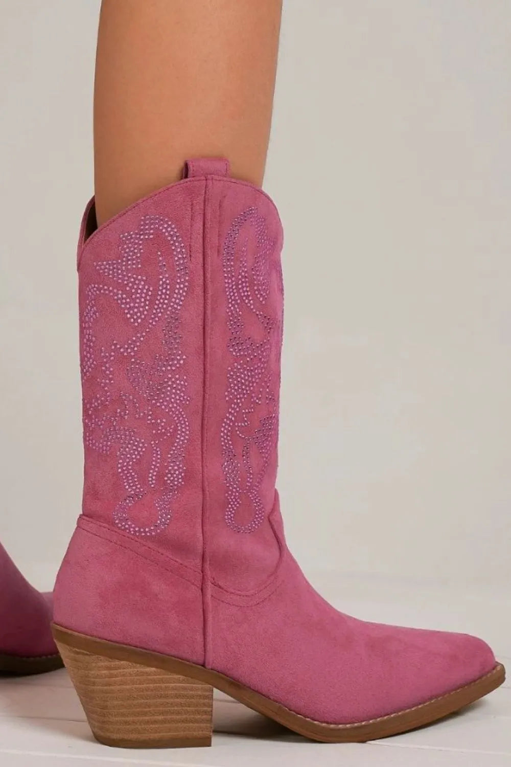 Beast Fashion rhinestone detail point toe boots in cerise with sparkling embellishments and sleek design.