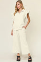 Trendsi cerulean double take texture ruffle short sleeve top with drawstring wide-leg pants set, stylish and comfortable ensemble.