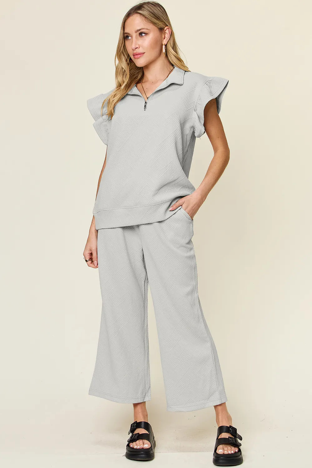 Cerulean double take texture ruffle short sleeve top and drawstring wide-leg pants set by Trendsi, casual stylish outfit.