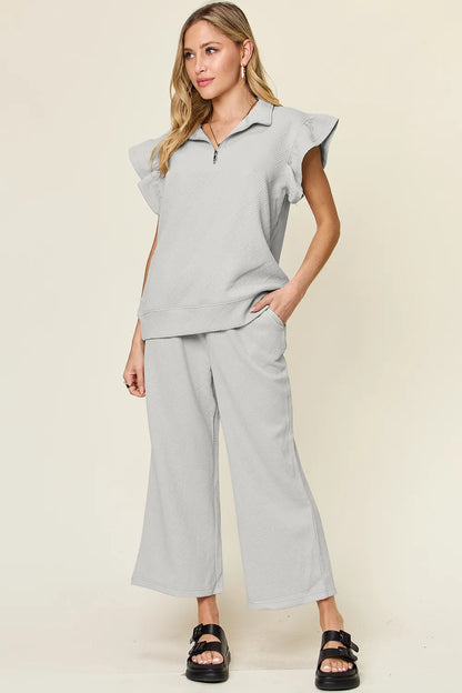 Cerulean double take texture ruffle short sleeve top and drawstring wide-leg pants set by Trendsi, casual stylish outfit.