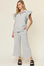 Cerulean double take texture ruffle short sleeve top and drawstring wide-leg pants set by Trendsi, casual stylish outfit.