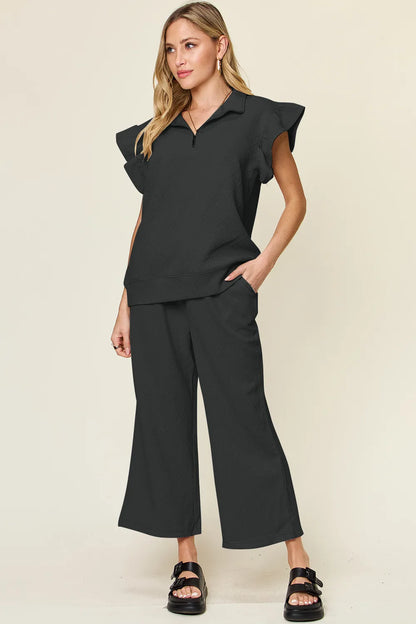 Cerulean blue double take texture ruffle short sleeve top with drawstring wide-leg pants set by Trendsi, stylish and comfortable outfit.