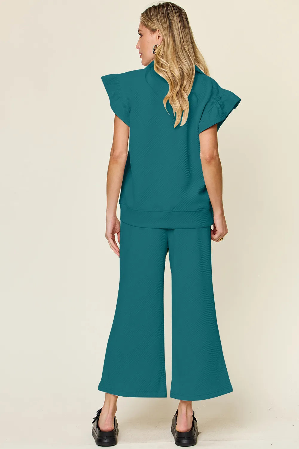 Cerulean blue double take texture ruffle short sleeve top with drawstring wide-leg pants set by Trendsi, casual stylish outfit.