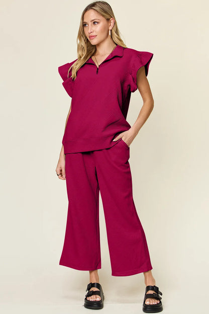 Trendsi double take texture ruffle short sleeve top with drawstring wide-leg pants set in cerulean color, casual stylish outfit.