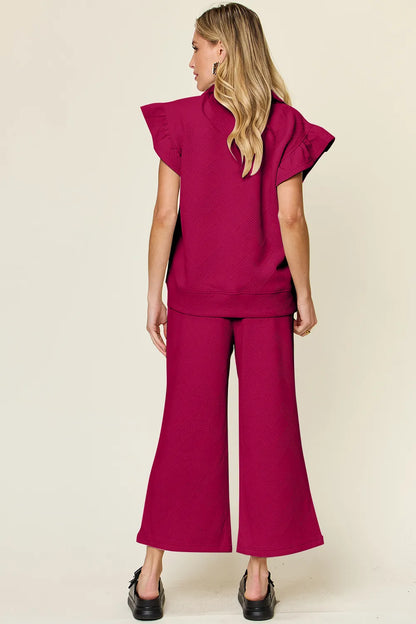 Cerulean blue double take texture ruffle short sleeve top with matching drawstring wide-leg pants set by Trendsi.