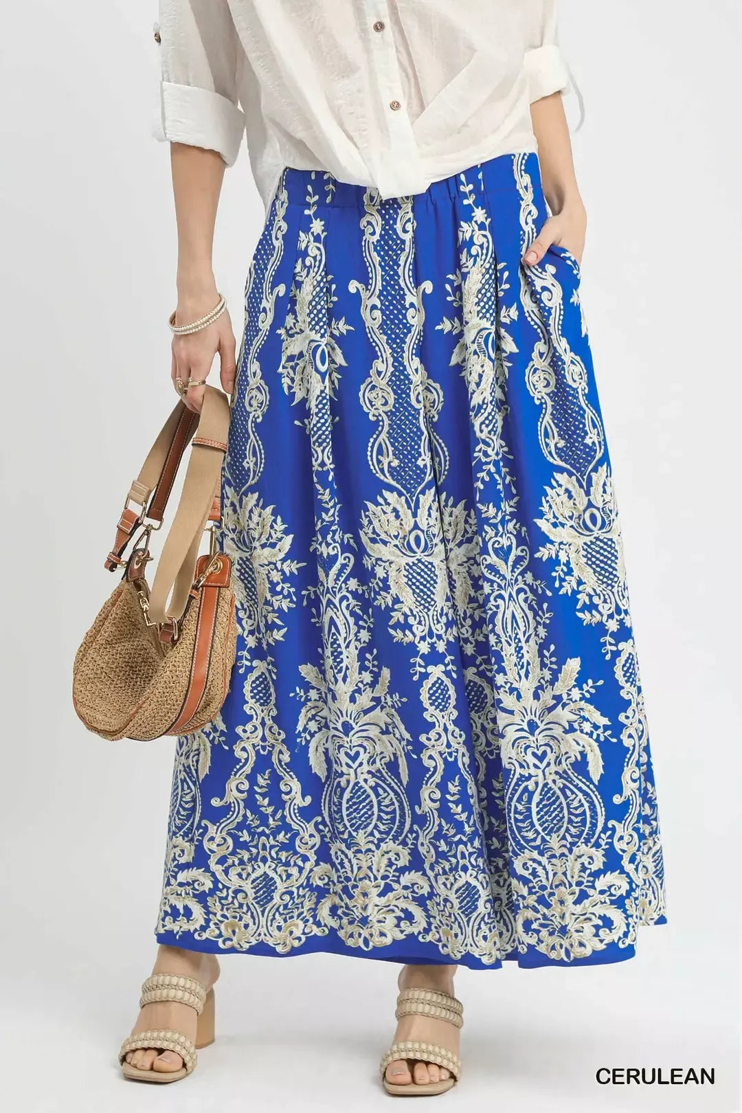 Cerulean Umgee border print wide-leg pants with relaxed fit and flowy fabric, styled for casual and bohemian looks.