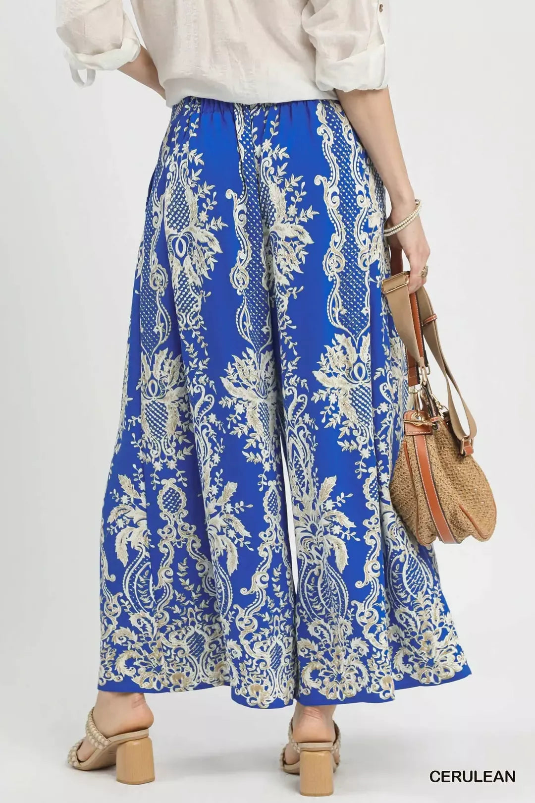 Cerulean Umgee border print wide-leg pants featuring a relaxed fit and stylish pattern, perfect for casual or boho outfits.