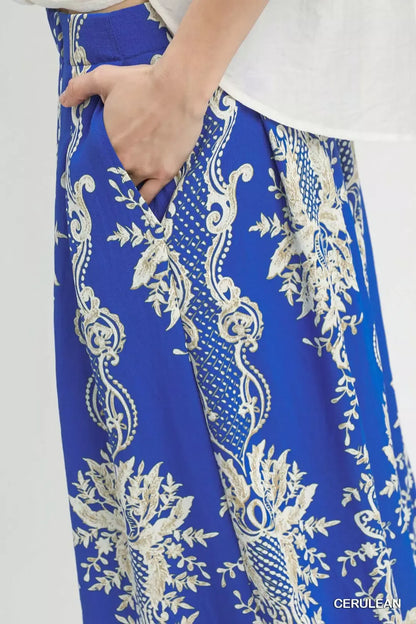 Cerulean Umgee border print wide-leg pants with relaxed fit and flowy silhouette, perfect for casual or chic summer outfits.