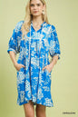 Cerulean blue Umgee floral babydoll dress with pockets, lightweight fabric, and relaxed fit, perfect for casual wear.