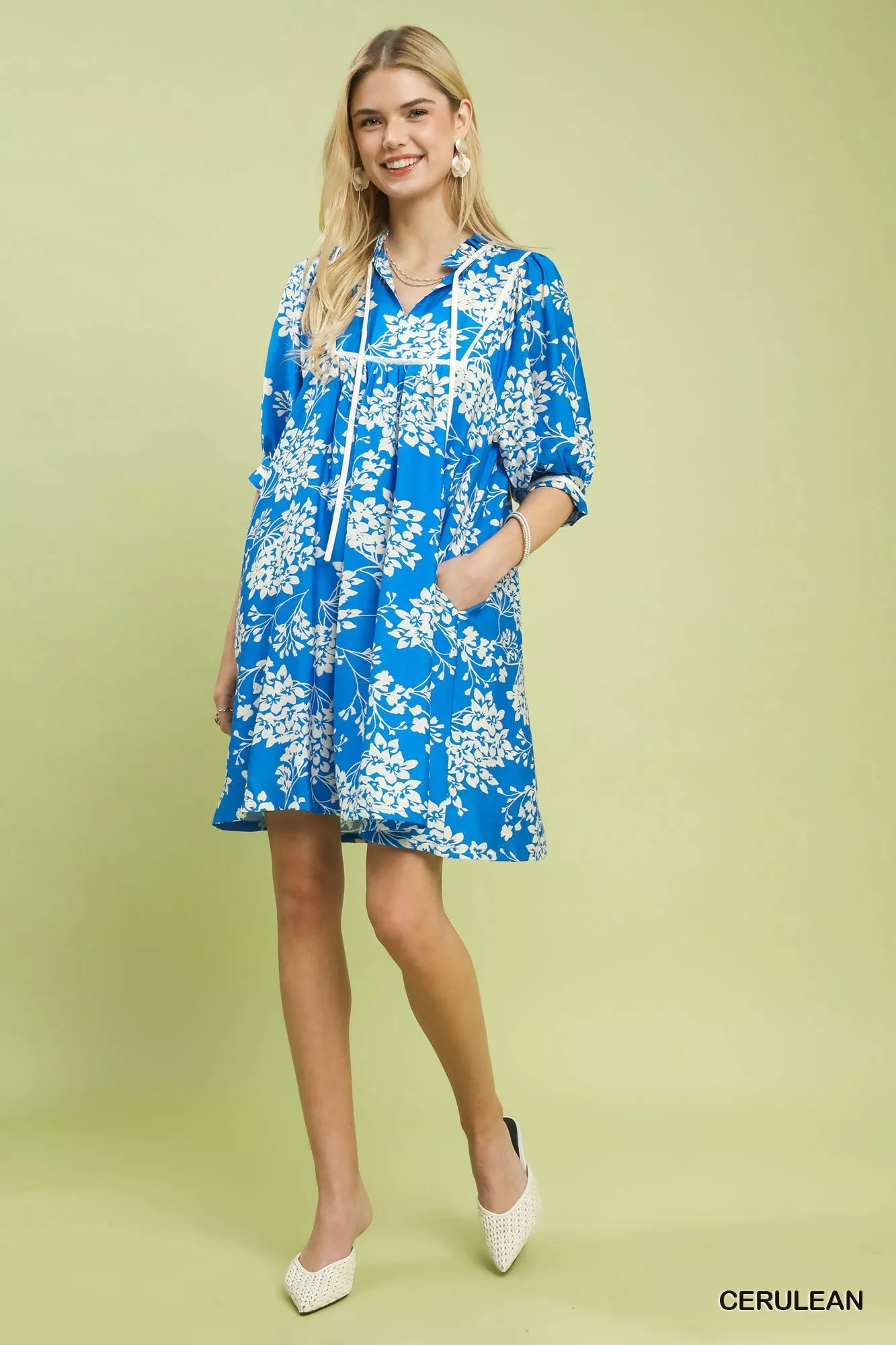 Cerulean blue Umgee floral babydoll dress with pockets, featuring a relaxed fit and feminine floral print.