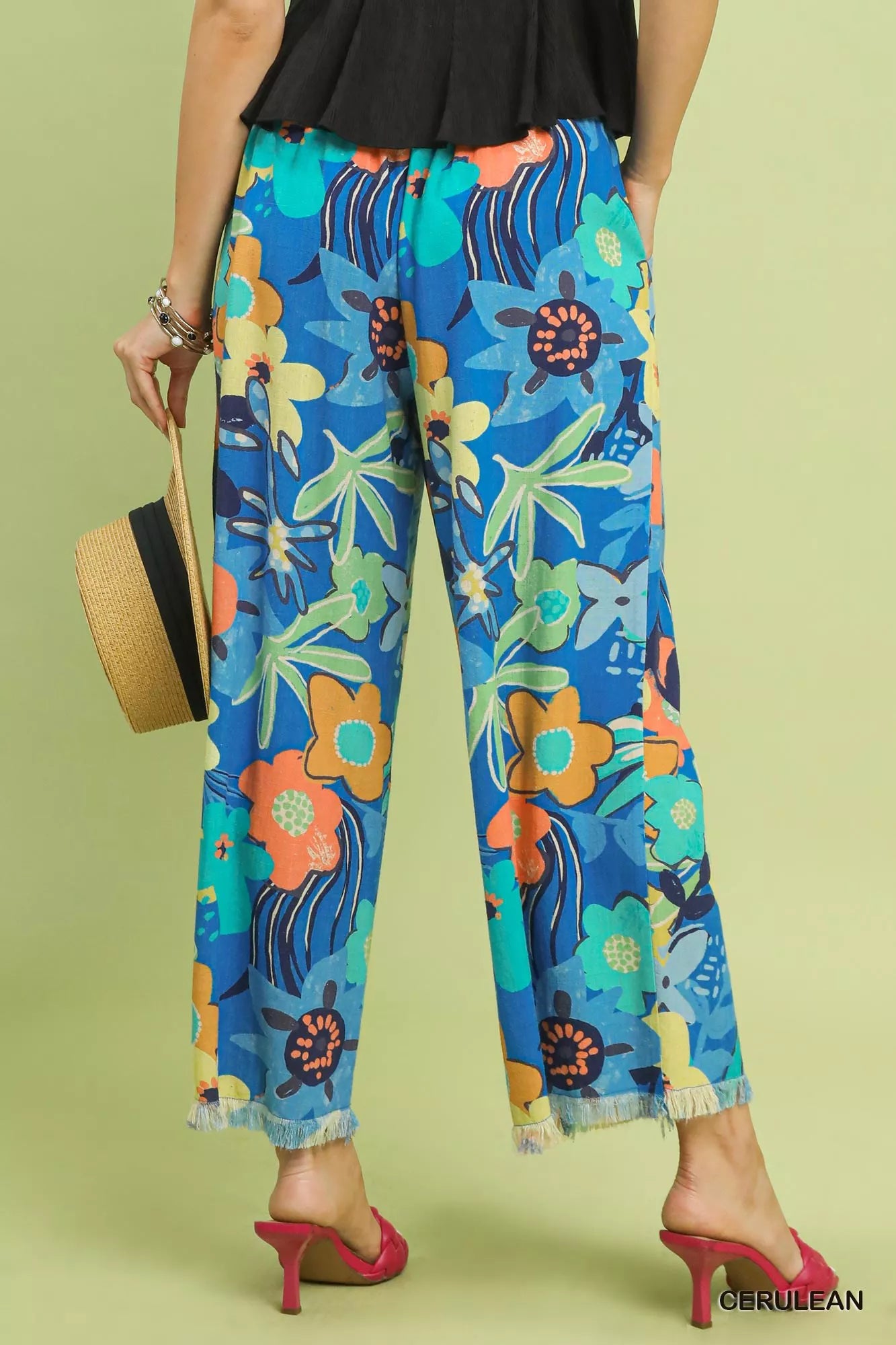 Umgee floral print wide-leg pants with a relaxed fit in cerulean, featuring a vibrant floral pattern and comfortable wide-leg design.