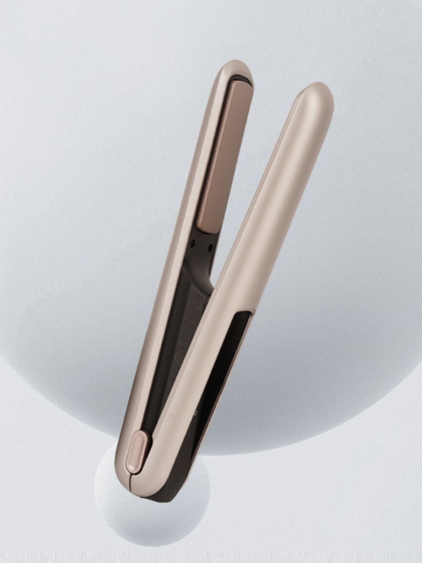 Champagne gold ceramic curling iron with fast heating technology from Trendsi, perfect for creating smooth, styled curls.