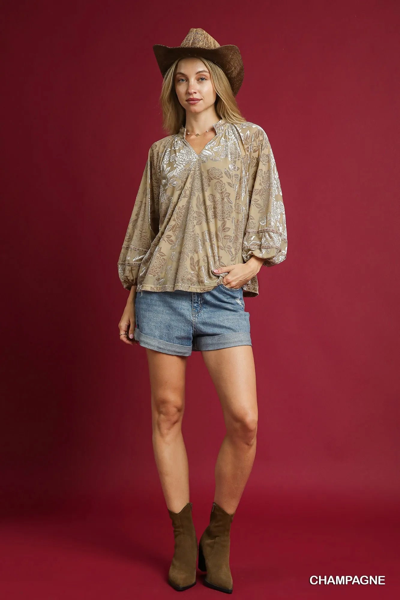 Umgee floral velvet blouse with balloon sleeves, in champagne color, featuring a stylish and elegant design.