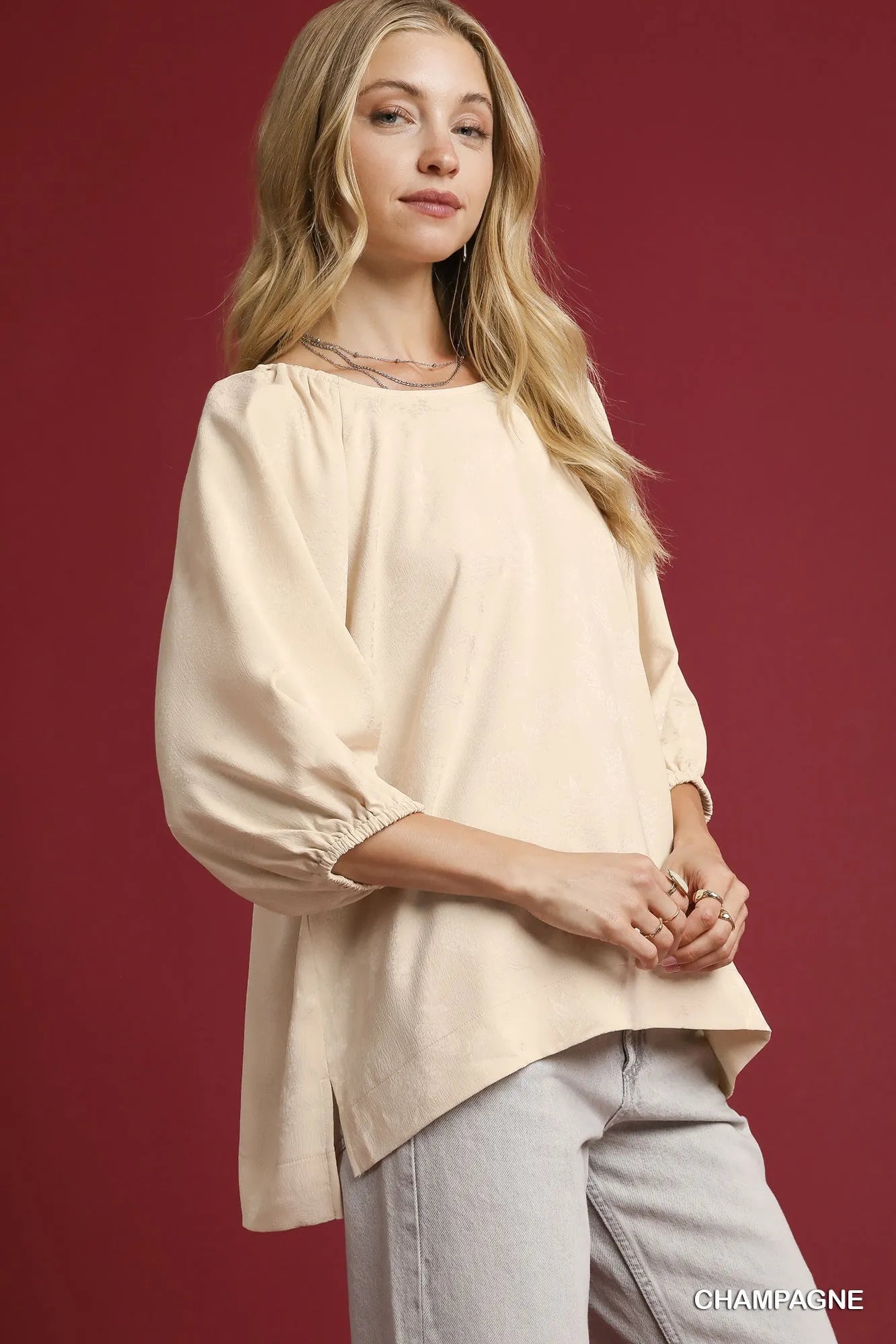 Champagne satin jacquard balloon sleeve blouse by Umgee, featuring elegant puffed sleeves and intricate fabric pattern.