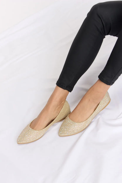 Forever Link rhinestone point toe flat slip-ons by Trendsi featuring sparkling rhinestones and sleek slip-on design.