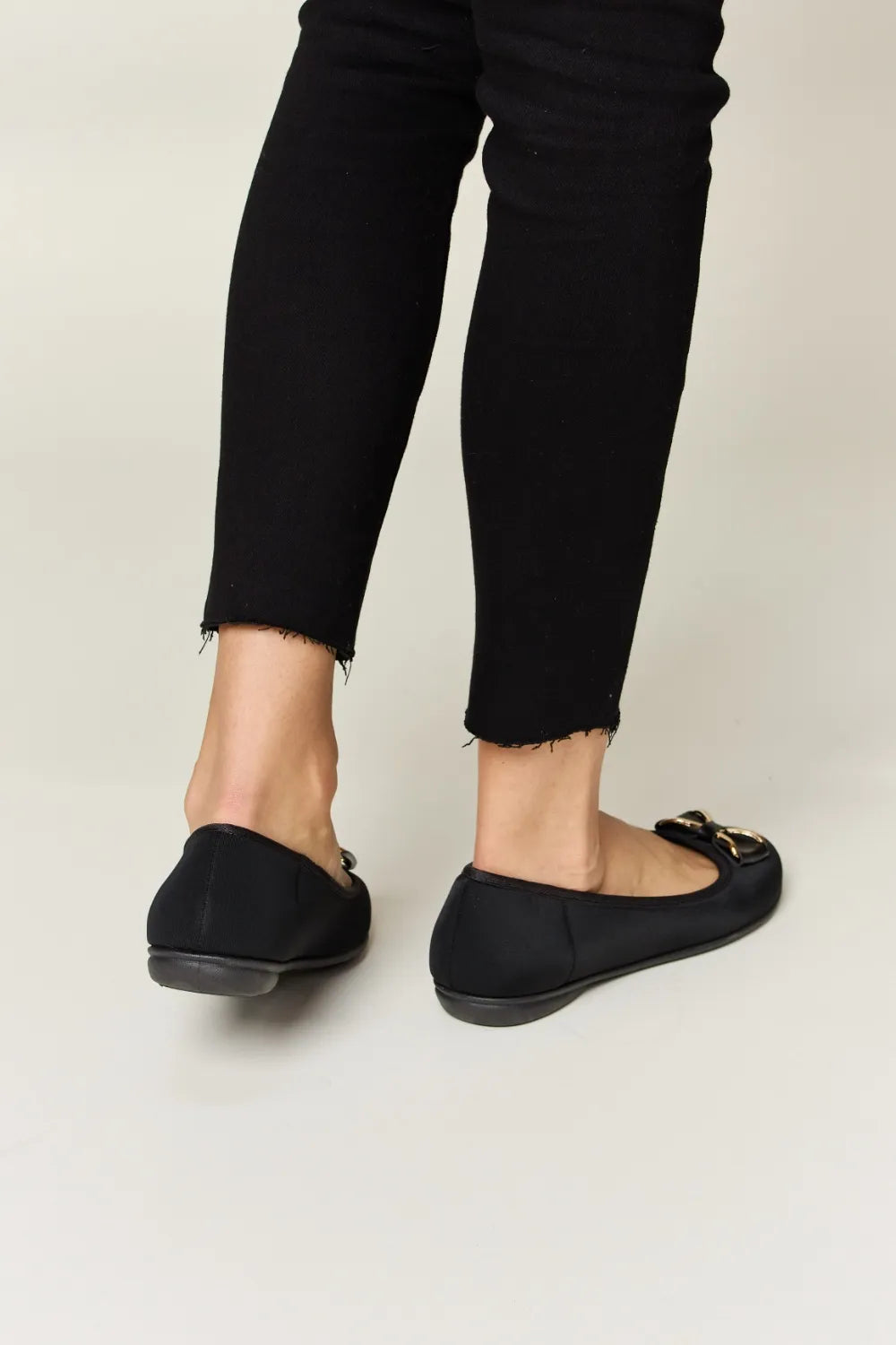 Charcoal Trendsi Forever Link metal buckle flat loafers with lycra material, showcasing a sleek, comfortable slip-on design.