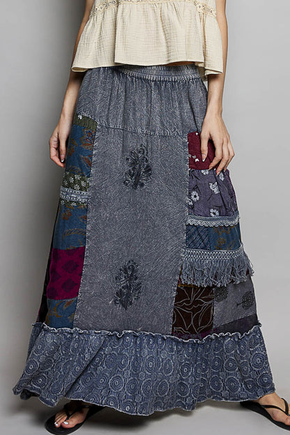 Charcoal multi-colored printed patchwork embroidered ruffled skirt by Trendsi, featuring intricate stitching and layered ruffle details.