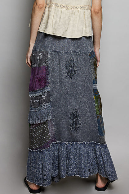 Charcoal multi-colored patchwork embroidered ruffled skirt by Trendsi, featuring intricate stitching and layered ruffle design.