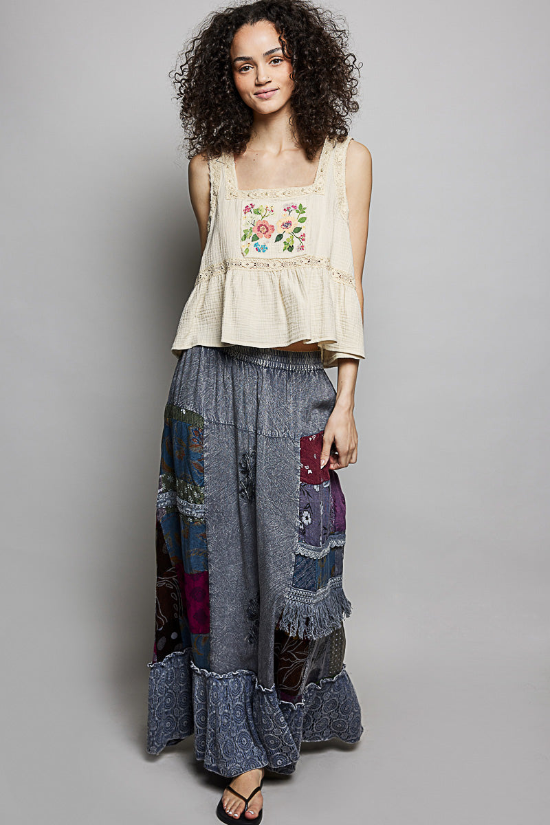 Charcoal multi-colored printed patchwork embroidered ruffled skirt by Trendsi, featuring intricate embroidery and layered ruffle details.