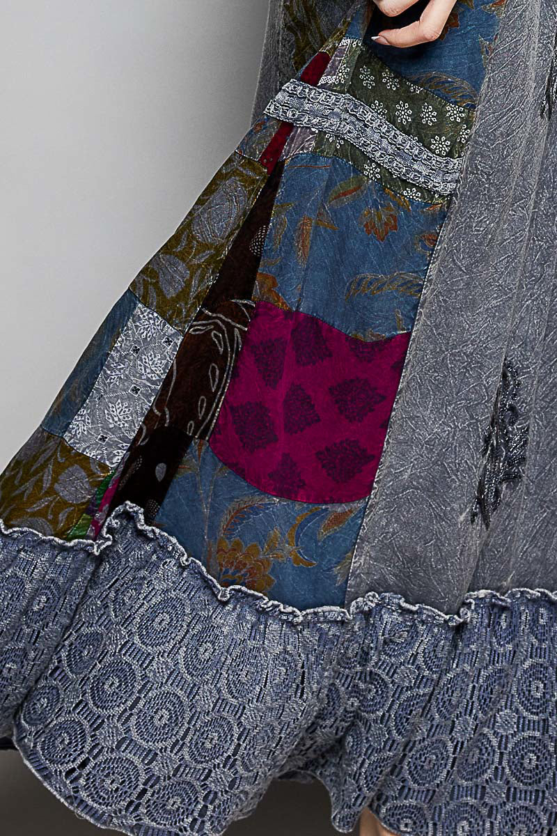 Charcoal multi-pattern patchwork embroidered ruffled skirt by Trendsi, showcasing intricate embroidery and flowing ruffle details.