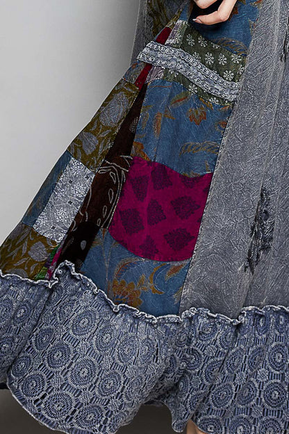 Charcoal multi-pattern patchwork embroidered ruffled skirt by Trendsi, showcasing intricate embroidery and flowing ruffle details.