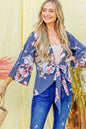 Charcoal floral print top with front tie knot from Trendsi, featuring a stylish and casual design perfect for everyday wear.