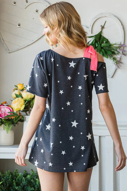 Charcoal Heimish short sleeve top with full-size star print and asymmetrical neckline, stylish and modern women's fashion.