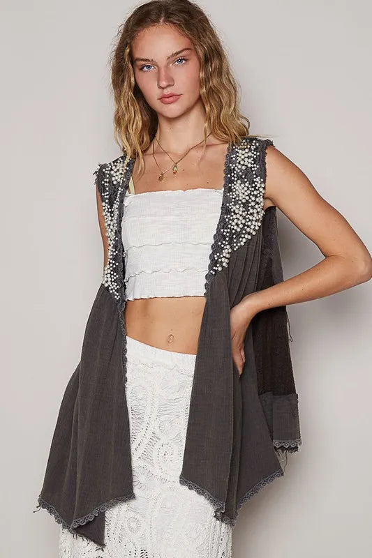 Charcoal POL Trendsi embroidered pearls sleeveless open front cardigan with pearl accents and a relaxed fit.