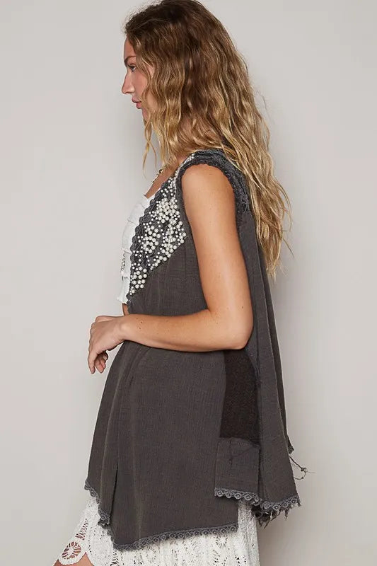 Charcoal POL embroidered pearls open front sleeveless cardigan by Trendsi, featuring intricate pearl embroidery and a stylish open design.