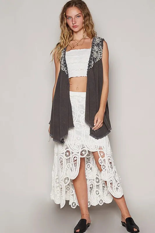 Charcoal POL embroidered pearls open front sleeveless cardigan by Trendsi, featuring delicate pearl embroidery and a stylish open design.