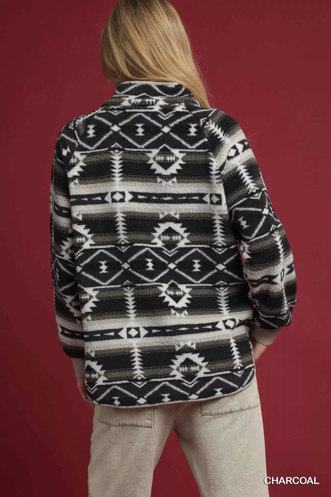 Charcoal Umgee Aztec print sherpa pullover with cozy, plush fabric and intricate pattern, perfect for casual winter wear.