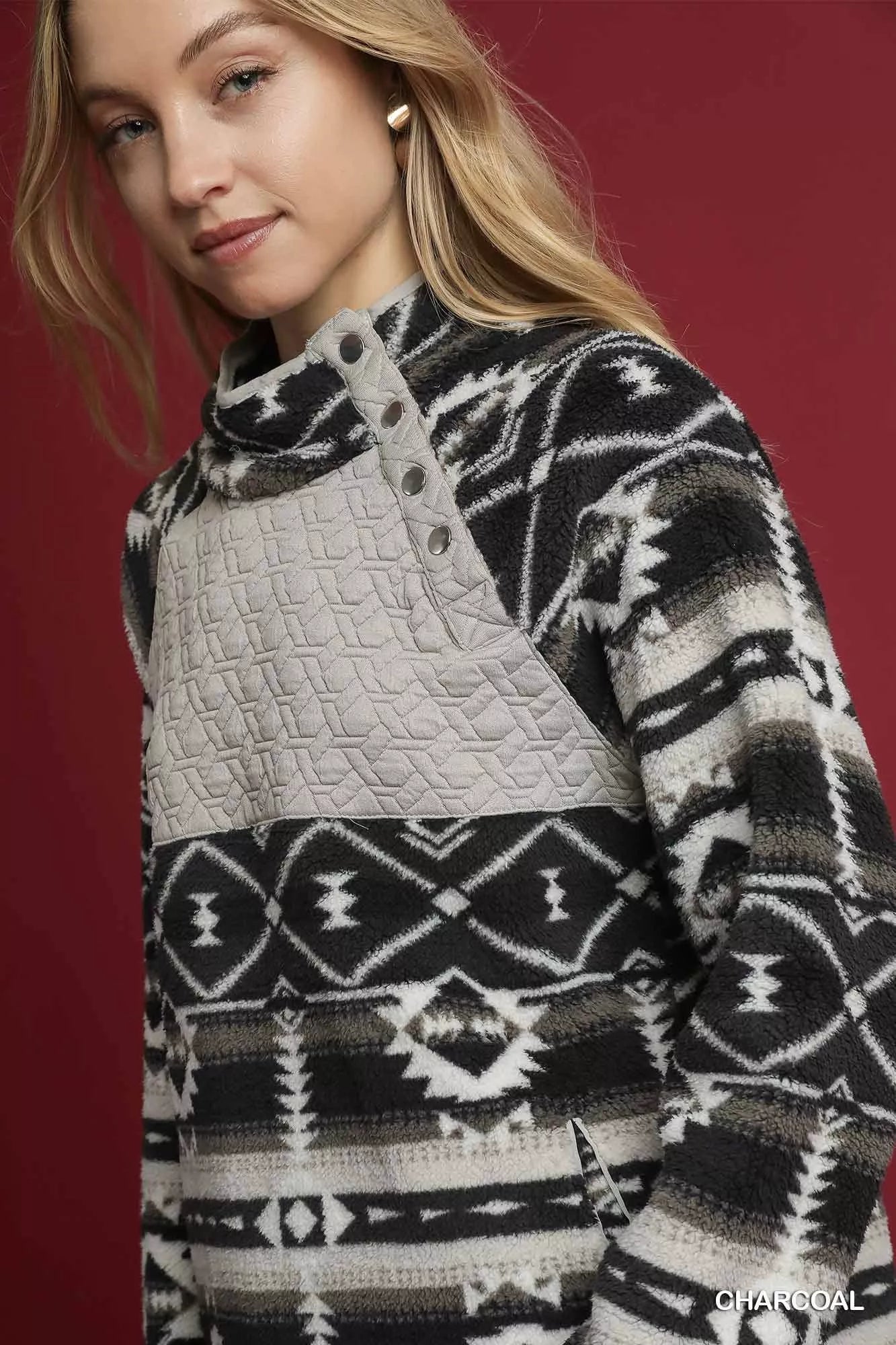 Charcoal Umgee Aztec print Sherpa pullover with cozy fleece lining, featuring a relaxed fit and stylish pattern.