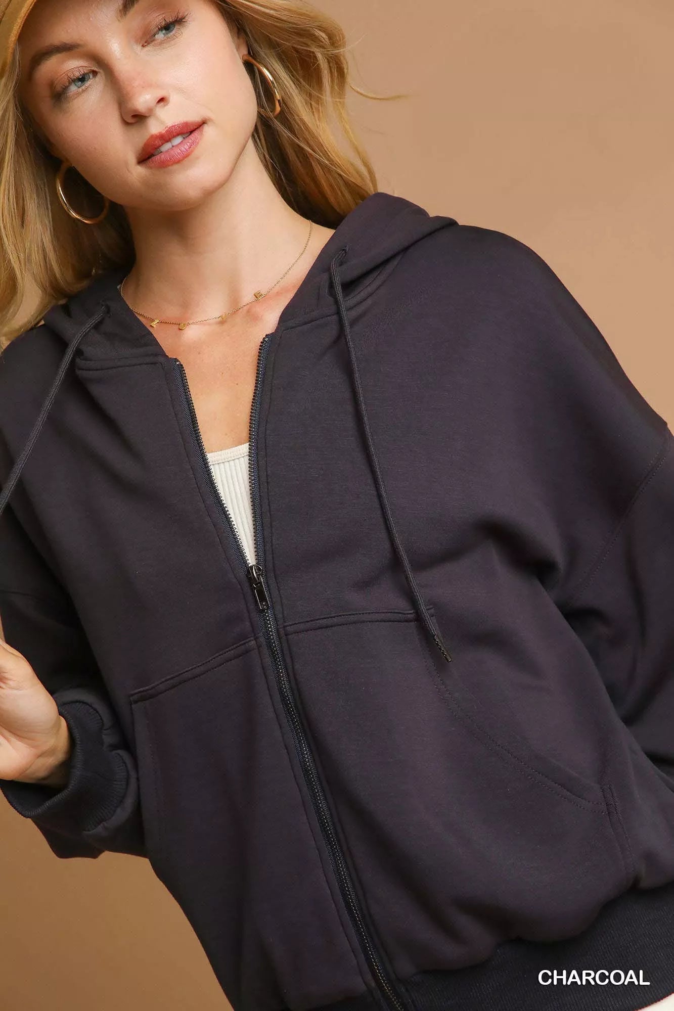 Charcoal Umgee zip-up fleece hooded jacket with front pockets, casual style, shown in size XS.