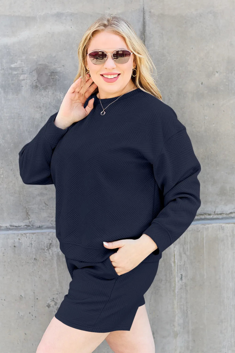 Trendsi Double Take chestnut long sleeve textured top and drawstring shorts set on a model, casual loungewear look.