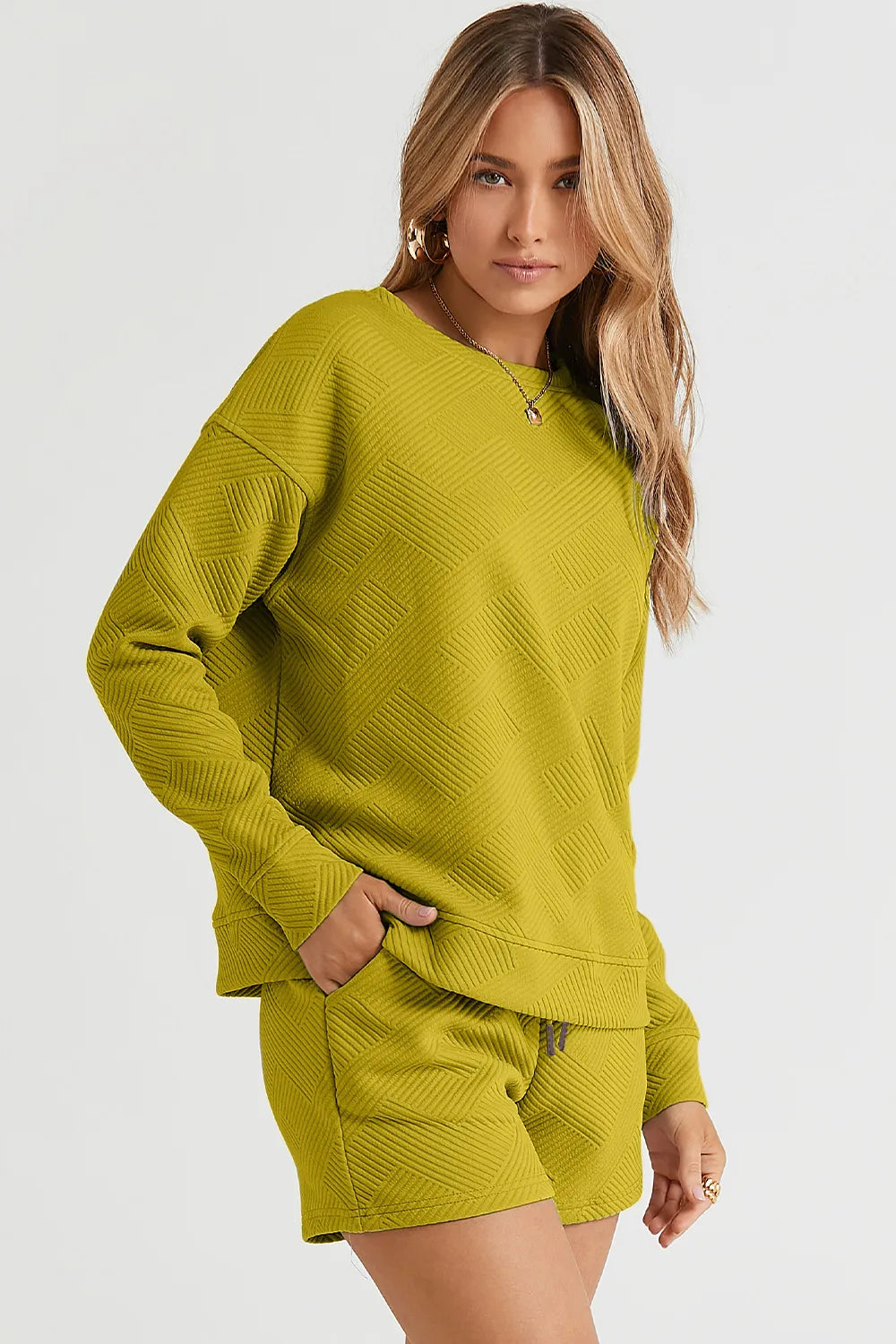 Trendsi chestnut-colored double take full-size textured long sleeve top with matching drawstring shorts set, casual and stylish.