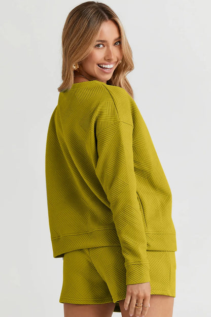 Trendsi chestnut-colored long sleeve textured top with matching drawstring shorts set, casual and comfortable for everyday wear.